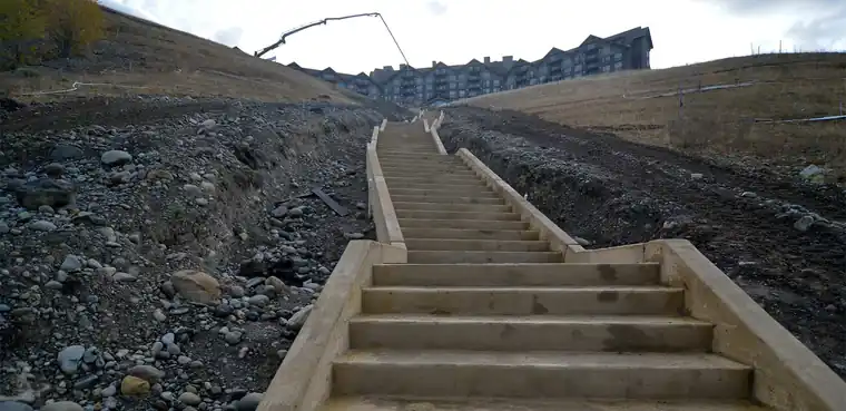 The 1,000 Steps climbing the hillside at Suncadia Resort with a boom pump at the top