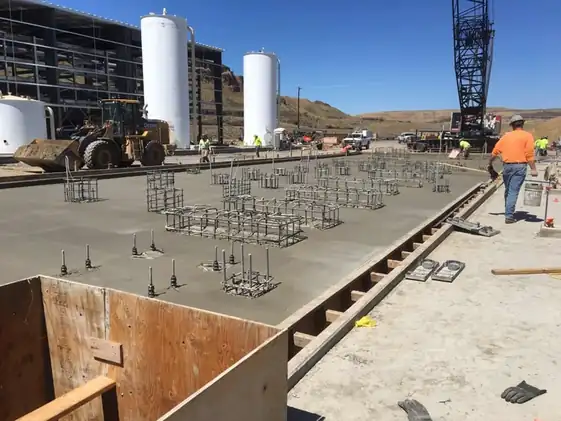 Anchor bolt cages set in a new deck slab at the Columbia Pulp plant near Starbuck